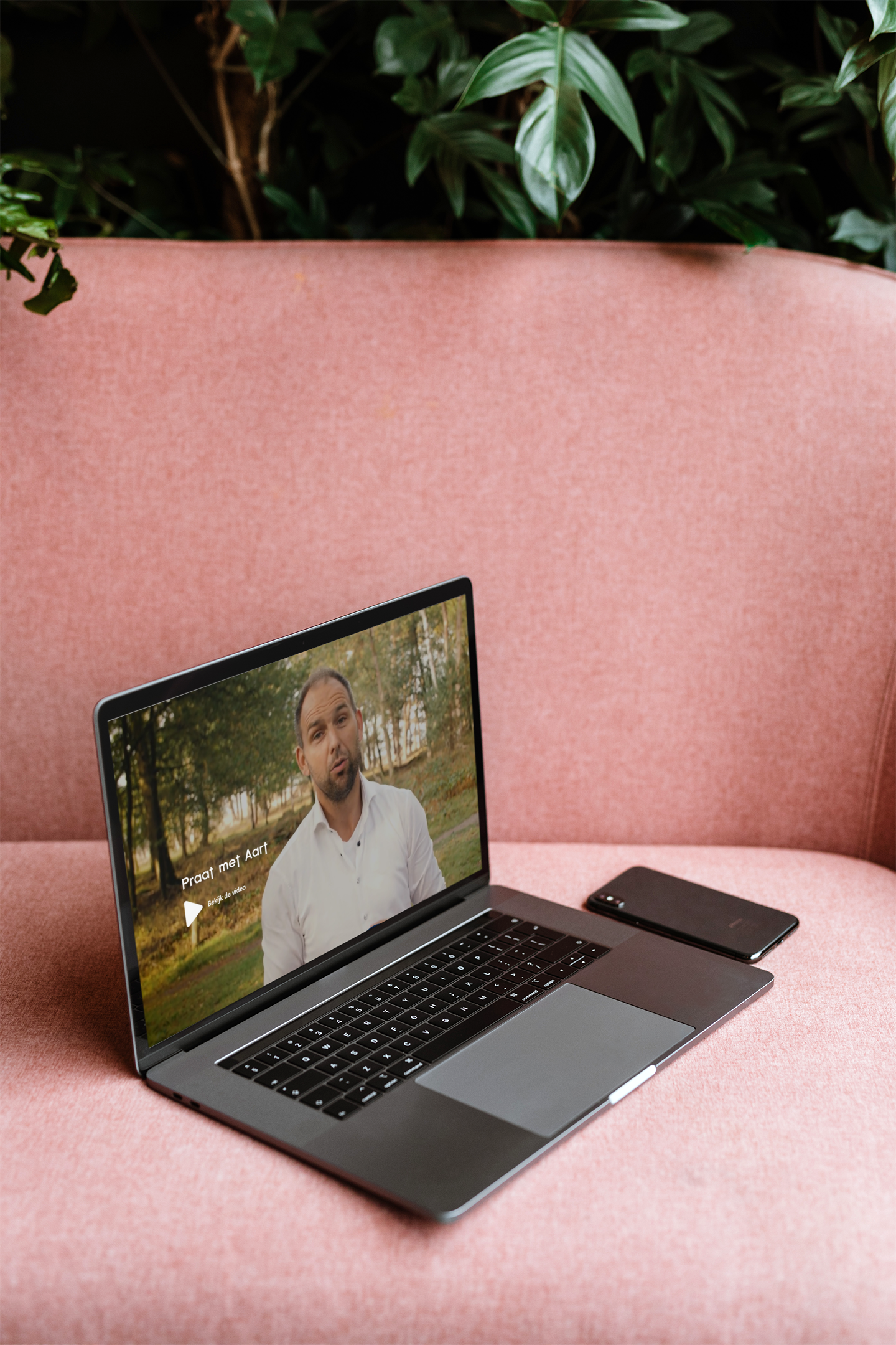 mockup-of-a-macbook-on-a-pink-sofa-2456-el1